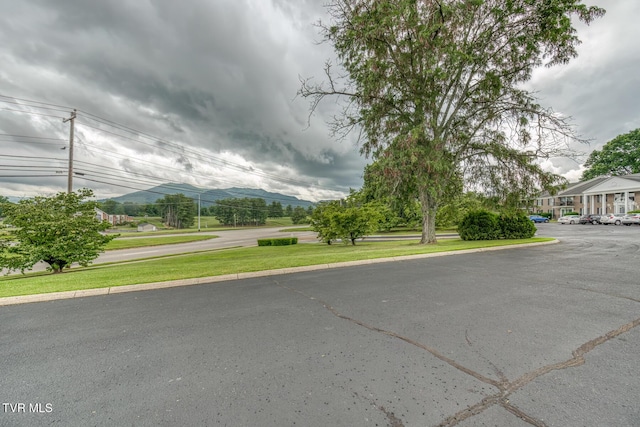 202 University Pkwy Unit 4E, Johnson City, TN 37604 - view of asphalt road featuring a mountain view and curbs