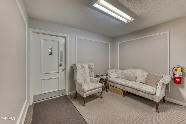 202 University Pkwy Unit 4E, Johnson City, TN 37604 - sitting room featuring carpet flooring and a textured ceiling