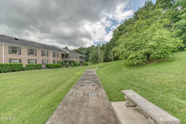 202 University Pkwy Unit 4E, Johnson City, TN 37604 - surrounding community with a yard and shuffleboard