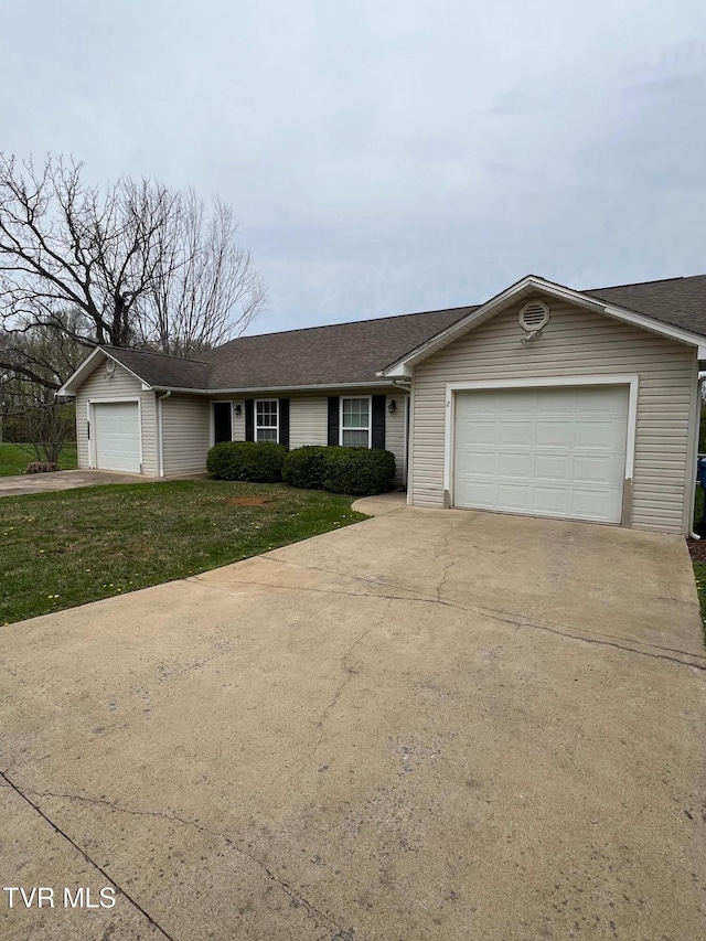 1107 Skyline Dr, Jonesborough, TN 37659 - ranch-style home featuring driveway, an attached garage, a front yard, and a shingled roof