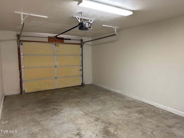 1107 Skyline Dr, Jonesborough, TN 37659 - garage featuring a garage door opener and baseboards