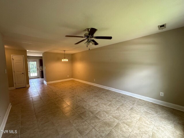 1107 Skyline Dr, Jonesborough, TN 37659 - empty room with a ceiling fan and a chandelier
