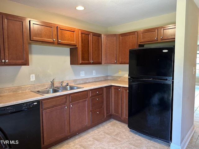 1107 Skyline Dr, Jonesborough, TN 37659 - kitchen with black appliances, light countertops, and brown cabinetry