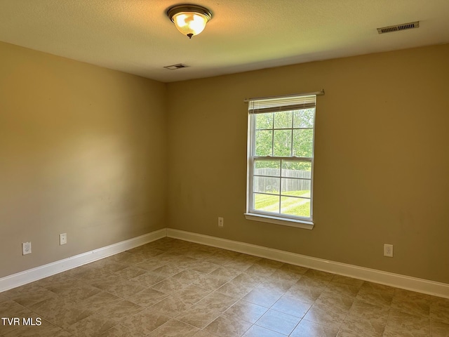 1107 Skyline Dr, Jonesborough, TN 37659 - empty room with baseboards and a textured ceiling