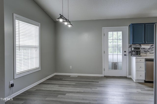 33 Mockingbird Ct, Jonesborough, TN 37659 - unfurnished dining area featuring wood finished floors and a textured ceiling