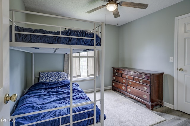 33 Mockingbird Ct, Jonesborough, TN 37659 - bedroom featuring a ceiling fan, wood finished floors, and a textured ceiling