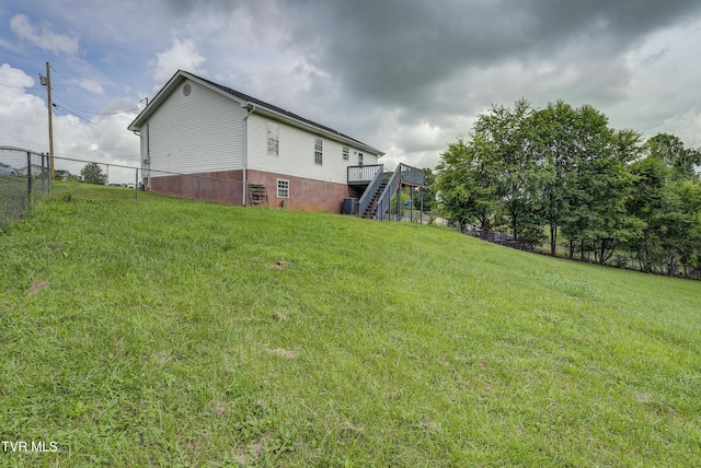 33 Mockingbird Ct, Jonesborough, TN 37659 - view of yard with stairway and a wooden deck
