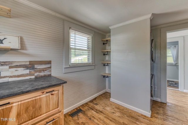 406 Mclaney Rd, Watauga, TN 37694 - dining room with ornamental molding, light wood-type flooring, and wooden walls