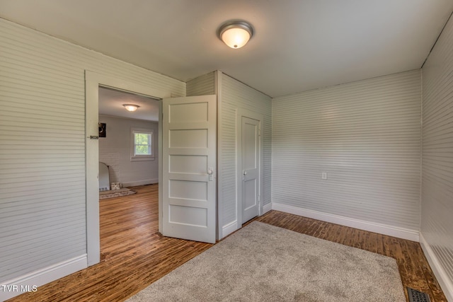 406 Mclaney Rd, Watauga, TN 37694 - unfurnished bedroom with wood finished floors and a closet