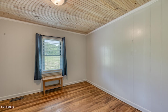 406 Mclaney Rd, Watauga, TN 37694 - spare room featuring wood finished floors, wooden ceiling, and crown molding