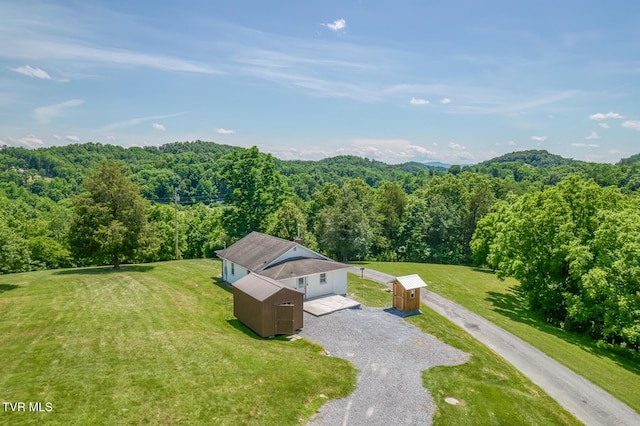 406 Mclaney Rd, Watauga, TN 37694 - aerial view of property and surrounding area with a heavily wooded area