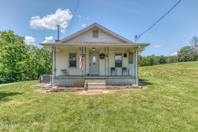 406 Mclaney Rd, Watauga, TN 37694 - view of front of house featuring a front lawn, a porch, and electric panel