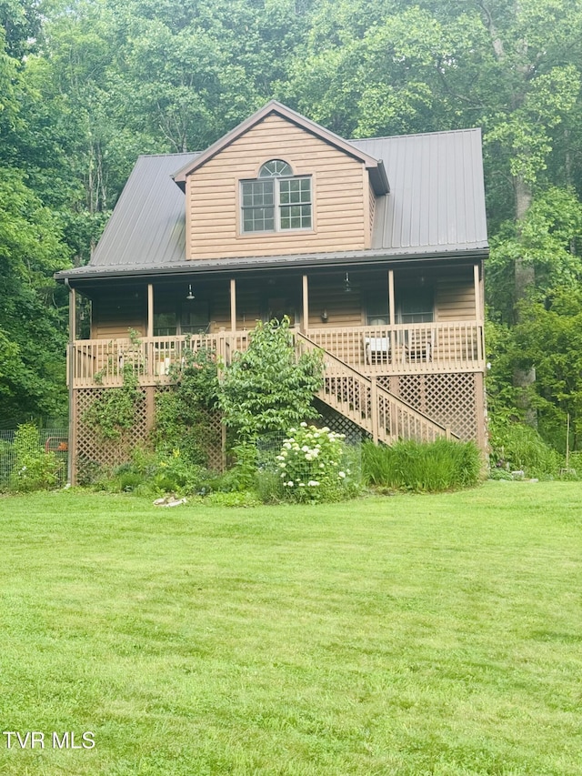 103 Meadow Springs Ct, Flag Pond, TN 37657 - view of front of home featuring a front yard, a porch, and a metal roof