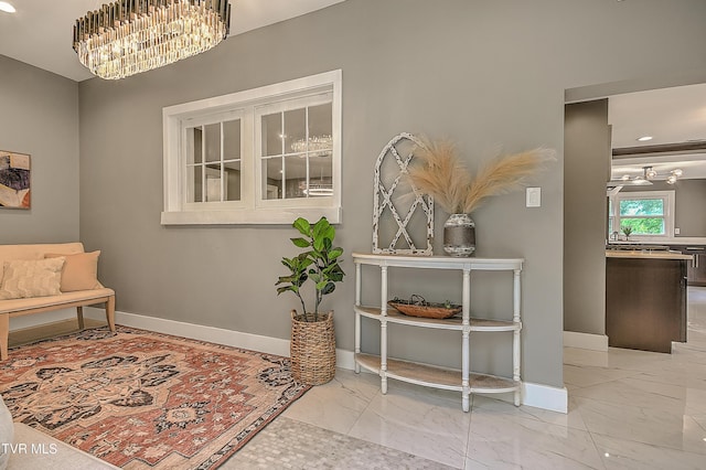2061 King College Rd, Bristol, TN 37620 - corridor with a chandelier, marble look tile flooring, and recessed lighting