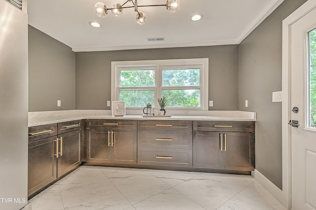 2061 King College Rd, Bristol, TN 37620 - kitchen featuring light marble finish floors, recessed lighting, light stone countertops, and dark brown cabinetry