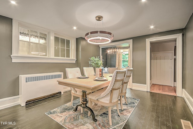 2061 King College Rd, Bristol, TN 37620 - dining area featuring radiator heating unit, dark wood-style flooring, a chandelier, and recessed lighting