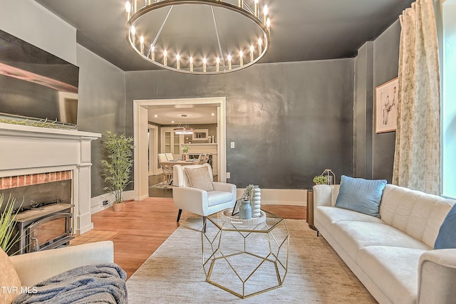 2061 King College Rd, Bristol, TN 37620 - living room with a chandelier, wood finished floors, and a wood stove