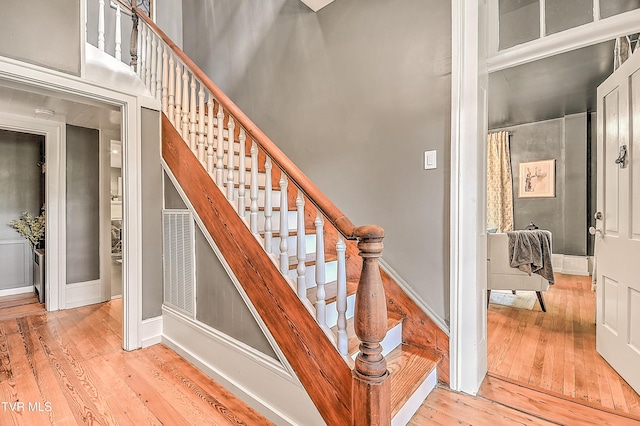 2061 King College Rd, Bristol, TN 37620 - stairs with wood-type flooring and a towering ceiling