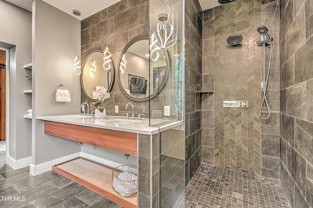2061 King College Rd, Bristol, TN 37620 - full bathroom with a tile shower, double vanity, tile walls, and tile patterned flooring