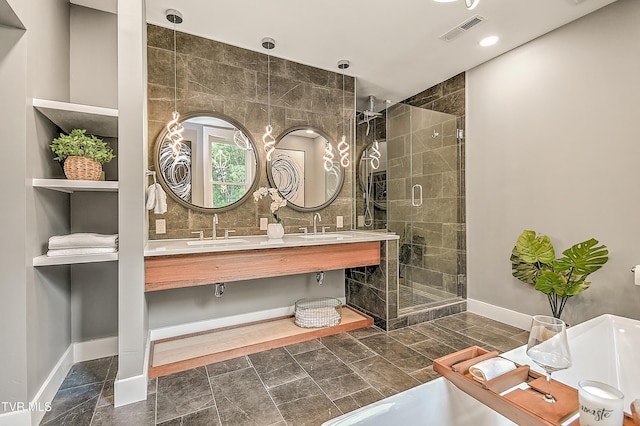 2061 King College Rd, Bristol, TN 37620 - full bathroom with double vanity, a stall shower, a tub, and recessed lighting