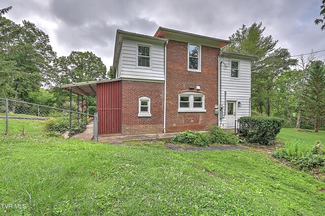 2061 King College Rd, Bristol, TN 37620 - rear view of house with brick siding