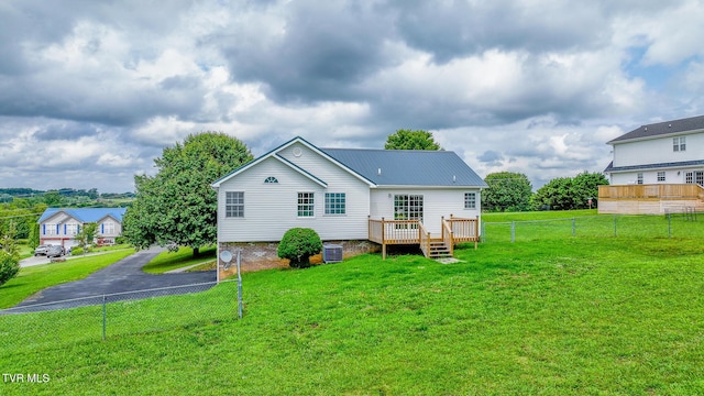 5 Pinehurst Ct, Limestone, TN 37681 - rear view of house featuring a deck, a fenced backyard, and a metal roof