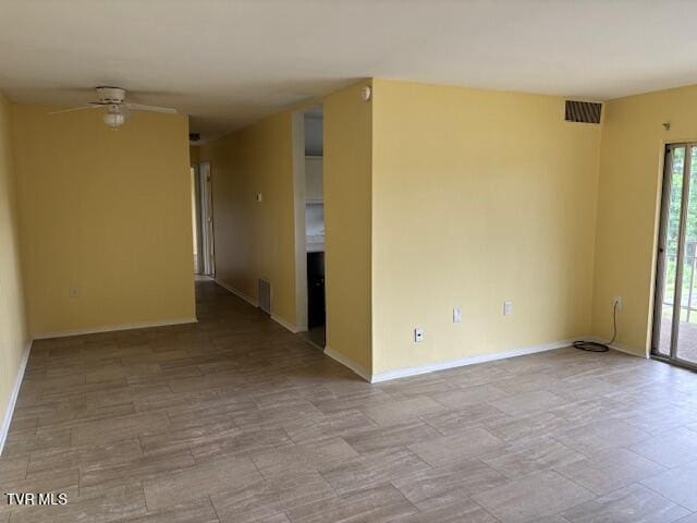 1085 Carriage Cir Unit 301, Bristol, VA 24201 - unfurnished room with baseboards and a ceiling fan