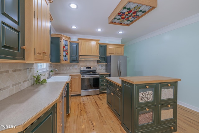 566 Beechwood Rd, Kingsport, TN 37663 - kitchen with stainless steel appliances, green cabinets, ornamental molding, custom exhaust hood, and light countertops