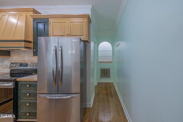 566 Beechwood Rd, Kingsport, TN 37663 - kitchen featuring appliances with stainless steel finishes, custom range hood, crown molding, wood finished floors, and tasteful backsplash