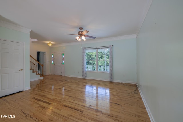 566 Beechwood Rd, Kingsport, TN 37663 - empty room featuring stairs, ceiling fan, light wood-style flooring, and crown molding