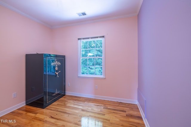 566 Beechwood Rd, Kingsport, TN 37663 - spare room with light wood-type flooring and crown molding