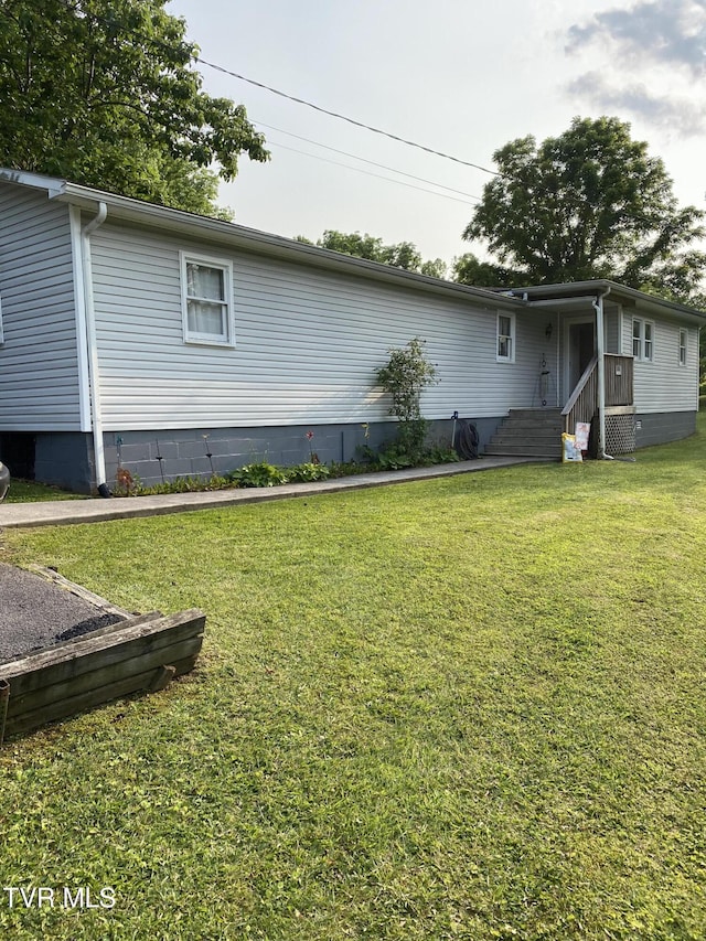 880 E Gilley Ave, Big Stone Gap, VA 24219 - view of home's exterior featuring a yard