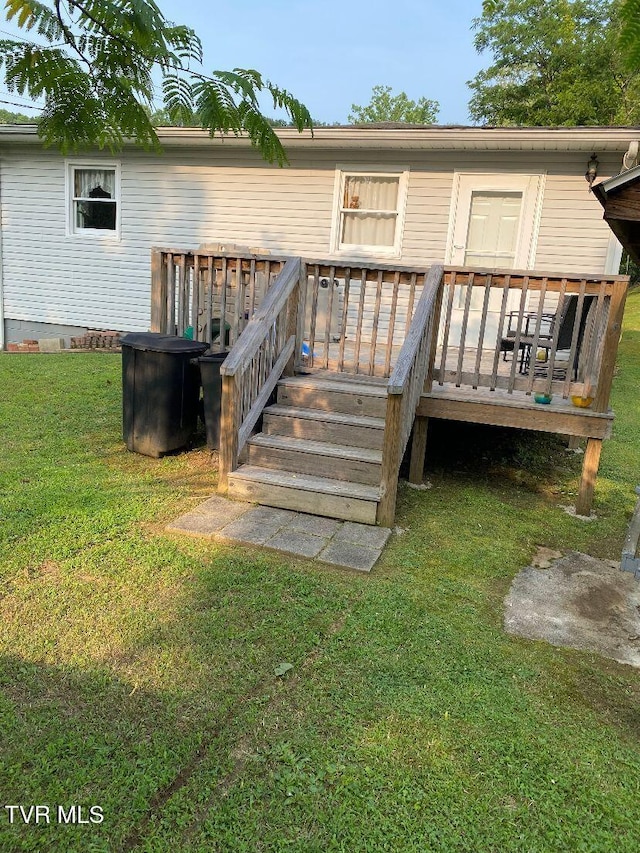 880 E Gilley Ave, Big Stone Gap, VA 24219 - back of house with a lawn and a deck