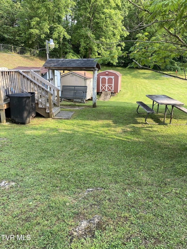 880 E Gilley Ave, Big Stone Gap, VA 24219 - view of grassy yard featuring a storage unit