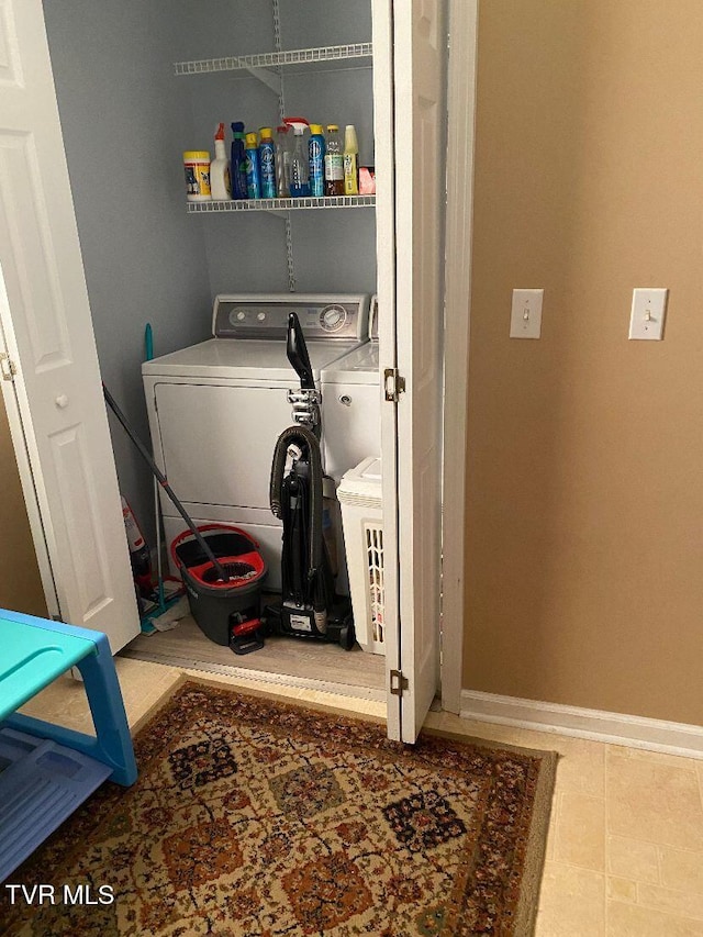 880 E Gilley Ave, Big Stone Gap, VA 24219 - laundry area with independent washer and dryer and baseboards