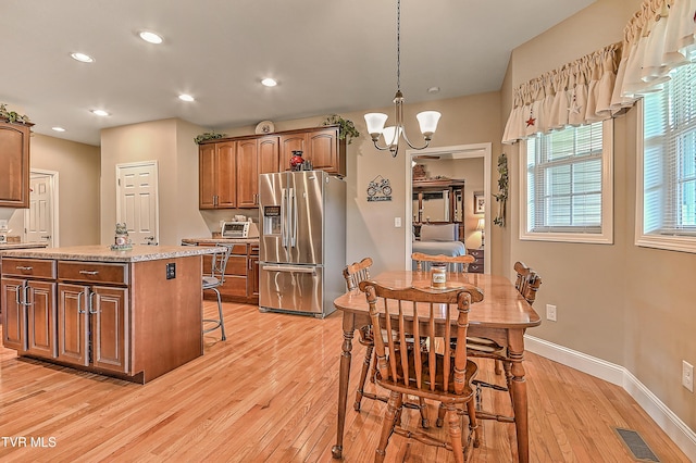5000 Aberlea Pl, Piney Flats, TN 37686 - dining space featuring light wood finished floors, a chandelier, and recessed lighting