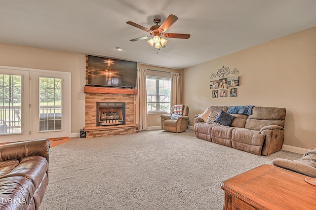 5000 Aberlea Pl, Piney Flats, TN 37686 - living room with ceiling fan, a fireplace, and carpet floors