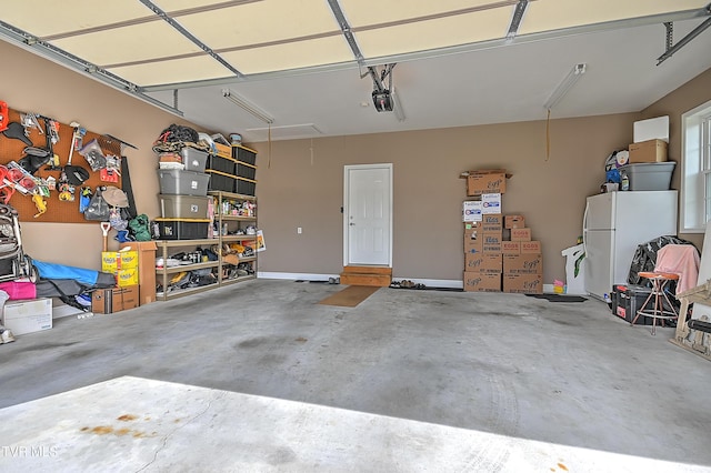 5000 Aberlea Pl, Piney Flats, TN 37686 - garage with freestanding refrigerator