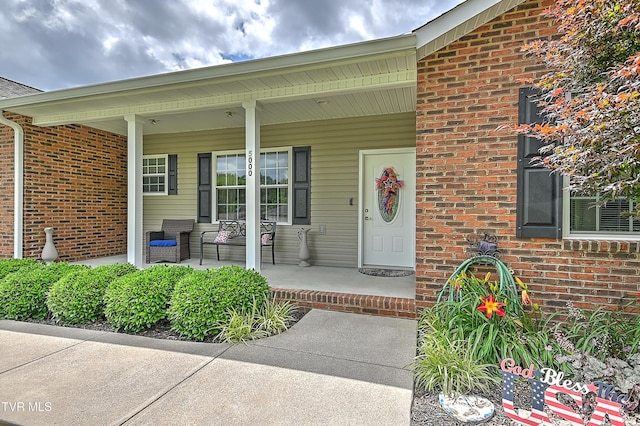 5000 Aberlea Pl, Piney Flats, TN 37686 - doorway to property featuring a porch and brick siding