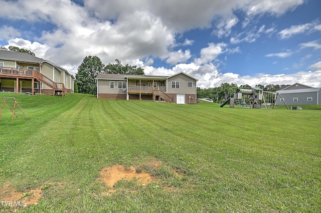 5000 Aberlea Pl, Piney Flats, TN 37686 - rear view of property featuring stairway, a playground, a lawn, and a wooden deck