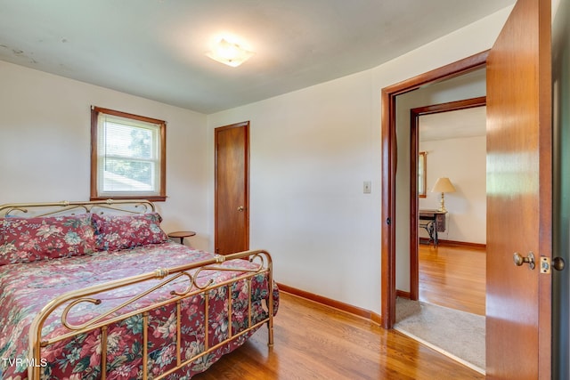 221 Mcfarland Dr, Kingsport, TN 37664 - bedroom with light wood-style flooring and baseboards