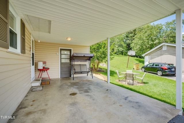221 Mcfarland Dr, Kingsport, TN 37664 - view of patio with a carport and outdoor dining space
