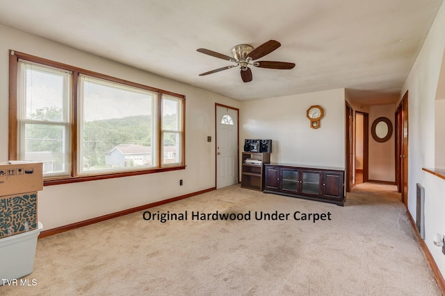 221 Mcfarland Dr, Kingsport, TN 37664 - unfurnished living room featuring light colored carpet and ceiling fan