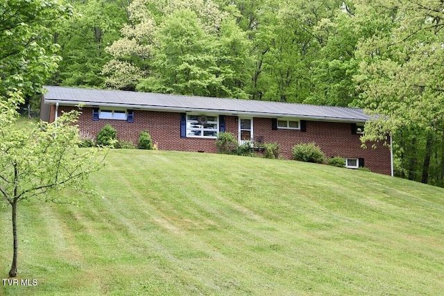 3219 Dungannon Rd, Coeburn, VA 24230 - ranch-style house featuring brick siding, a front lawn, and a view of trees