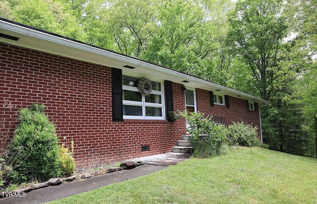 3219 Dungannon Rd, Coeburn, VA 24230 - view of front facade featuring brick siding and a front lawn