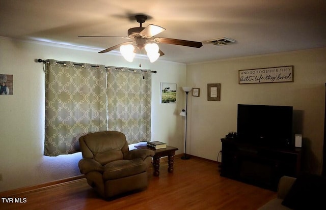 3219 Dungannon Rd, Coeburn, VA 24230 - living room with ornamental molding, ceiling fan, and wood finished floors