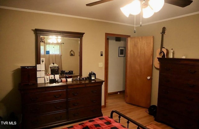 3219 Dungannon Rd, Coeburn, VA 24230 - bedroom featuring light wood-style floors, a ceiling fan, and ornamental molding