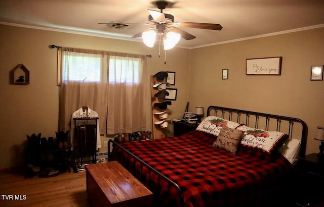3219 Dungannon Rd, Coeburn, VA 24230 - bedroom with wood finished floors, crown molding, and a ceiling fan