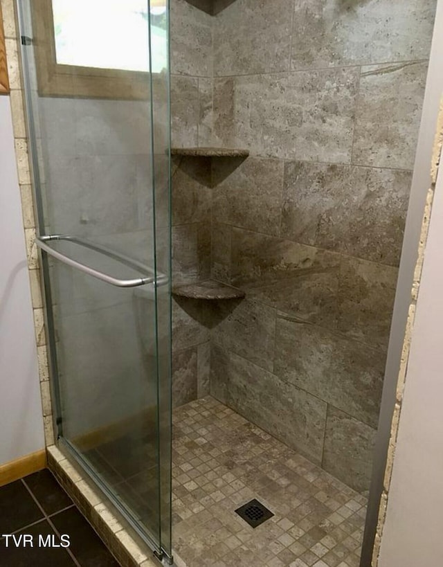 3219 Dungannon Rd, Coeburn, VA 24230 - bathroom with a stall shower and tile patterned floors