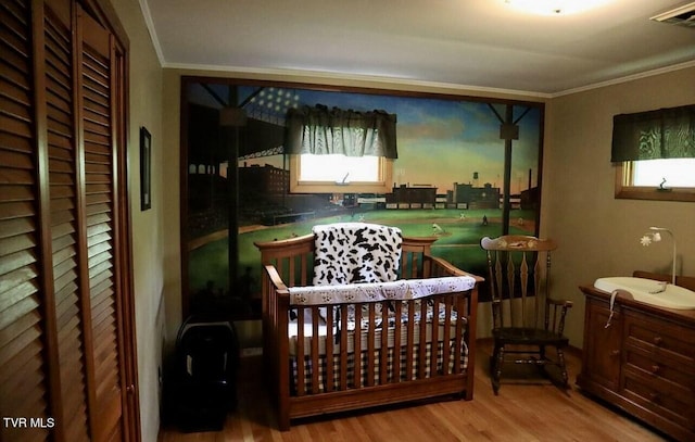 3219 Dungannon Rd, Coeburn, VA 24230 - bedroom with wood finished floors, crown molding, and multiple windows